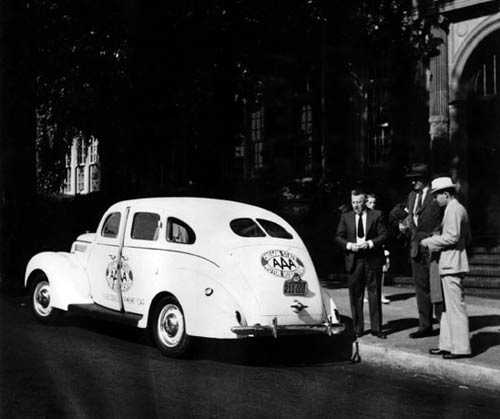 T. Raymond Conway, Thomas Wolfe, and Edward M. Miller gather around their “Travel Development Car” before beginning their trip in Portland, OR, June 20, 1938. (Thomas Wolfe Collection, Pack Memorial Public Library, Asheville, NC.)