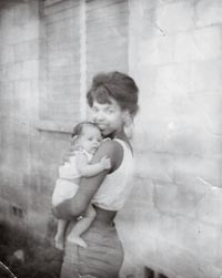 Woman Holding an Infant
