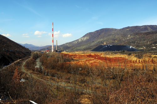 The Trepča mining and smelting complex, and its enormous slagheap, near the Osterrode Chesmin Lug resettlement camps for displaced Roma, North Mitrovica, Kosovo.