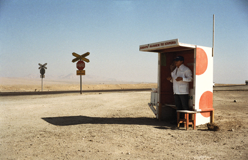 Ice cream seller Pablo Montero appears like a mirage in the desert, scooping up cones of vanilla and coffee ice cream for passing truckers and miners.