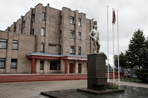 A statue of Lenin stands watch over the courtyard at the Mozyr Machine-Building Plant.