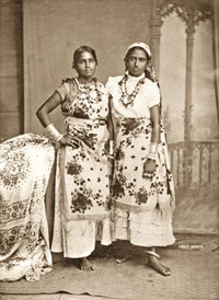 Two Coolie women in traditional dress.