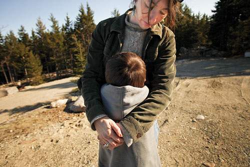 Jennifer Eaton Larrabee, outside, hugging her son, Jacob.