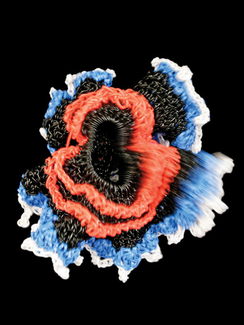 Plastic crochet sea floater by Evelyn Hardin.