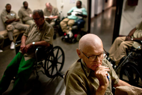 Roy Dunn, sixty-three, waits in a holding  area at the Kentucky State Reformatory in La Grange for his ride home