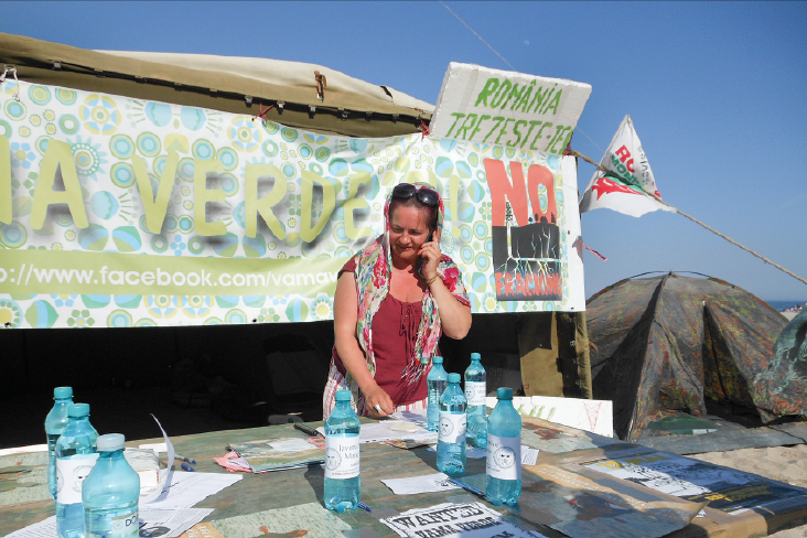 In the seaside village of Vama Veche, Romania, Rodica Cruceanu collects signatures to push for a parliamentary commission to investigate the environmental impact of fracking.