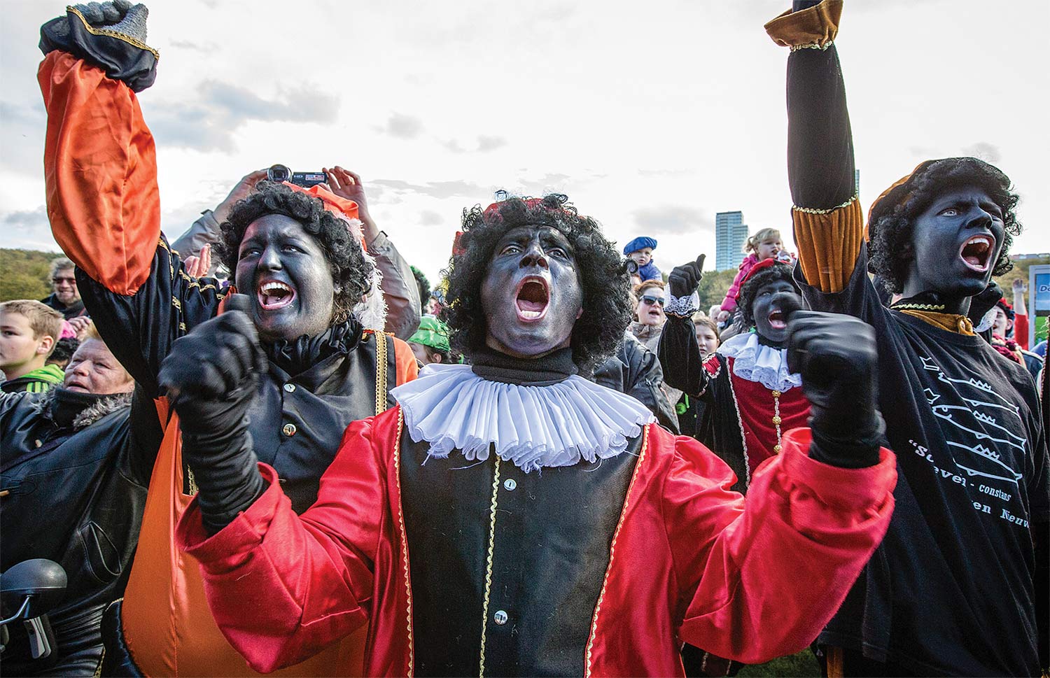 On October 26, 2013, several hundred people demonstrated at the Malieveld in The Hague to keep Zwarte Piet as part of the traditional Dutch Sinterklaas  celebration. The demonstration was an outgrowth  of a Facebook page dedicated to saving Zwarte Piet. (Bart Maat / Hollandse Hoogte / Redux)