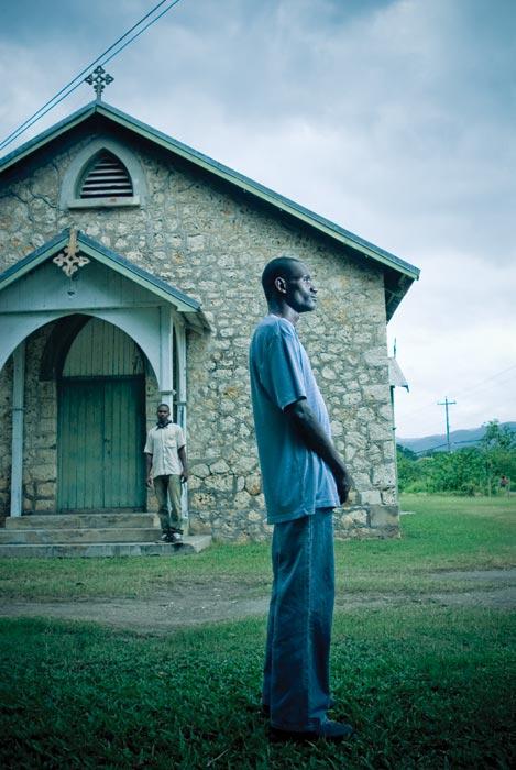 Glendon Asphall stands in front of a church near Portmore.