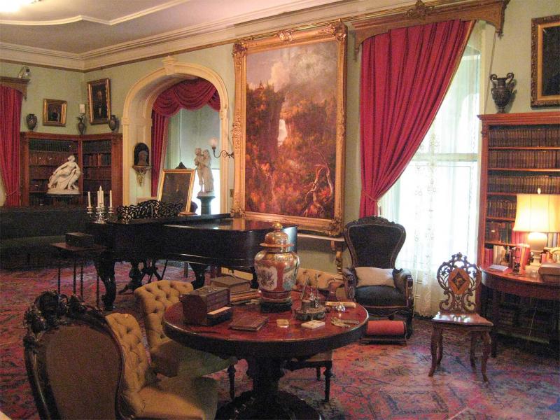 Seward House drawing room with Cole’s <i>Portage Falls on the Genesee</i>. (Courtesy of the Seward House Museum)