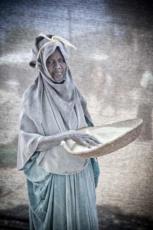 atima Mohamud Mohammad, 40 — I work as a maize husker in a milling factory. I make $80 a month, and since my husband is unemployed I have to support my nine children on my salary alone. My dream right now is simply to hold onto my job, even though the dust causes me allergy problems.