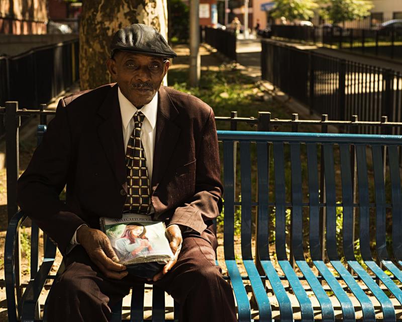 Jehovah's Witness relaxing, South Bronx, New York.