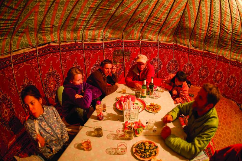  The climbing team relaxing inside a traditional Kazahk yurt. In the team’s perspective, the perfect  traveling home. 