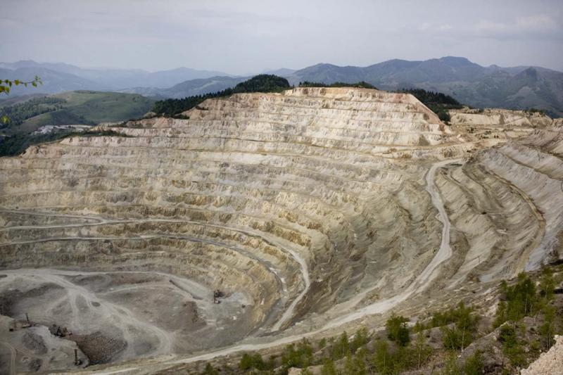 The open pit of Rosia Poieni, a large copper mine not far from Rosia Montana, shows the devastation of strip mining.