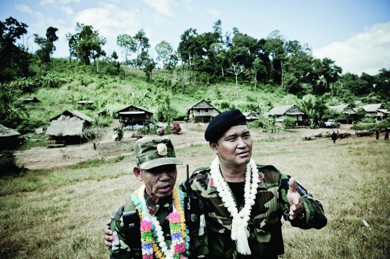 Colonel Nerdah (right) of the KNLA (Karen National Liberation Army) and Colonel Steele (left) of the DKBA (Democratic Karen Buddhist Army) at a truce ceremony in the village of Oo Kray Kee 3.7 miles inside of Burma from Thailand.