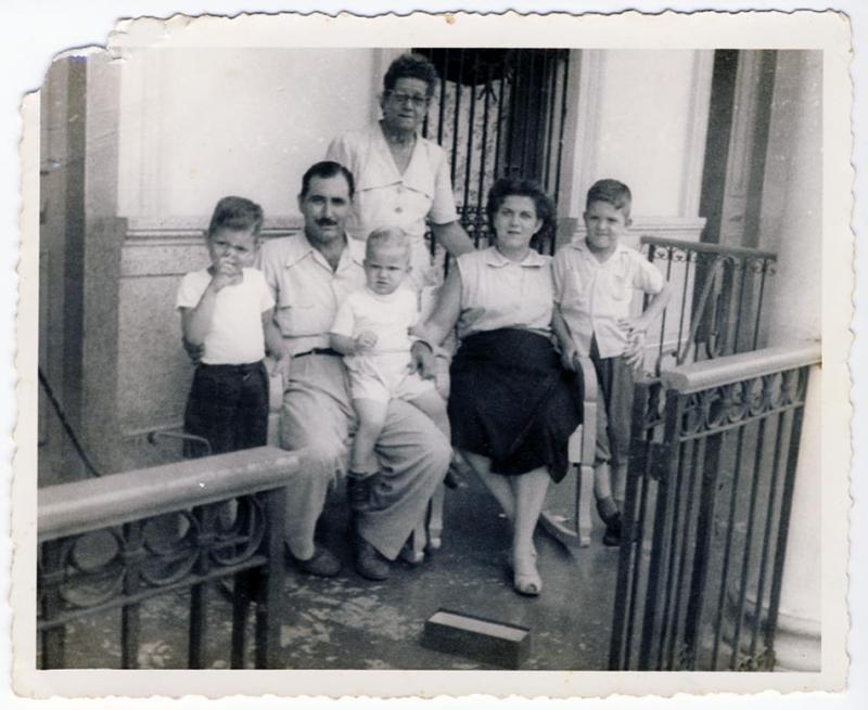Paul and Rubí, along with the three boys and Rubí’s mother, in Quivican. (Image courtesy of the author)