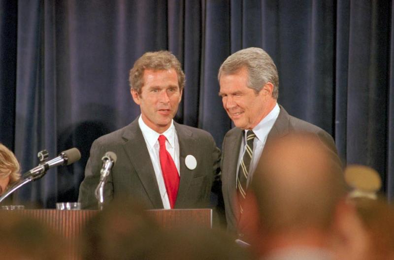 Robertson and a young George W. Bush before the Michigan delegation to the Republican convention in 1988 (Joe Polimeni / Bettmann / Corbis).