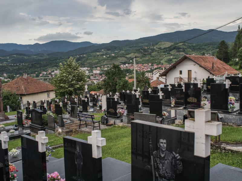A cemetery in Višegrad dedicated to Serb soldiers. Višegrad was the site of a 1992 Serb assault on Bosniak civilians. There were few reported Serb casualties. Experts say that Serb soldiers killed elsewhere are buried here as part of a larger revisionist effort. June 2020.