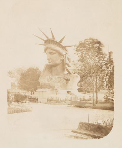 "Head of the Statue of Liberty on display in a park in Paris." Paris, France. (courtesy of the miriam and ira d. wallach division of art photography collection/new york public library)  