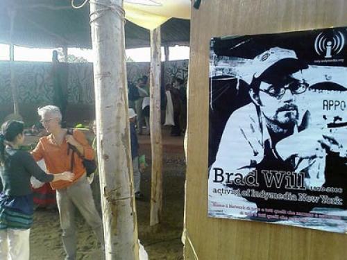An Indymedia poster honors Brad Will, on display at a gathering of westerners in Mali this past February. (Don Meliton / CC)