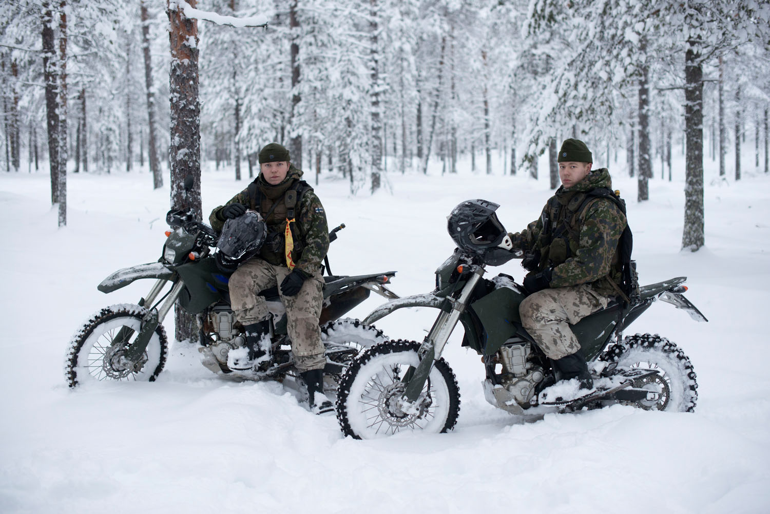 Scouts on motorbikes, part of the Finnish tank-unit strategy used to survey enemy activity as well as draw in enemy units. Lapland, Finland, December, 2018