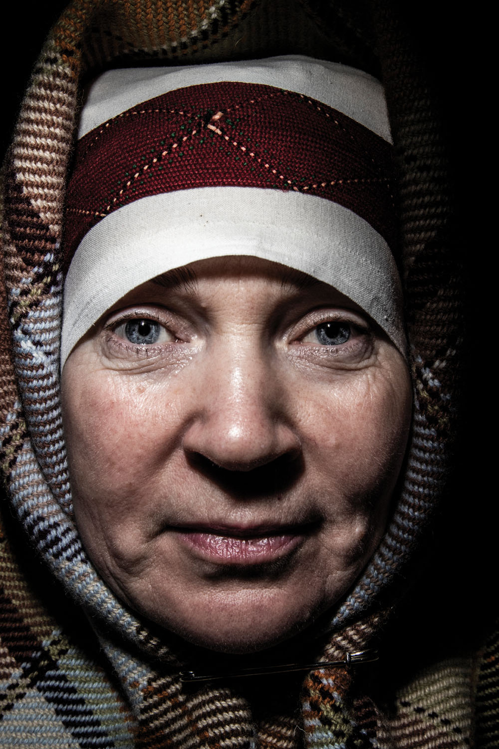 Ülle, a Seto artist in traditional dress. Obinitsa, Estonia, March 2025.