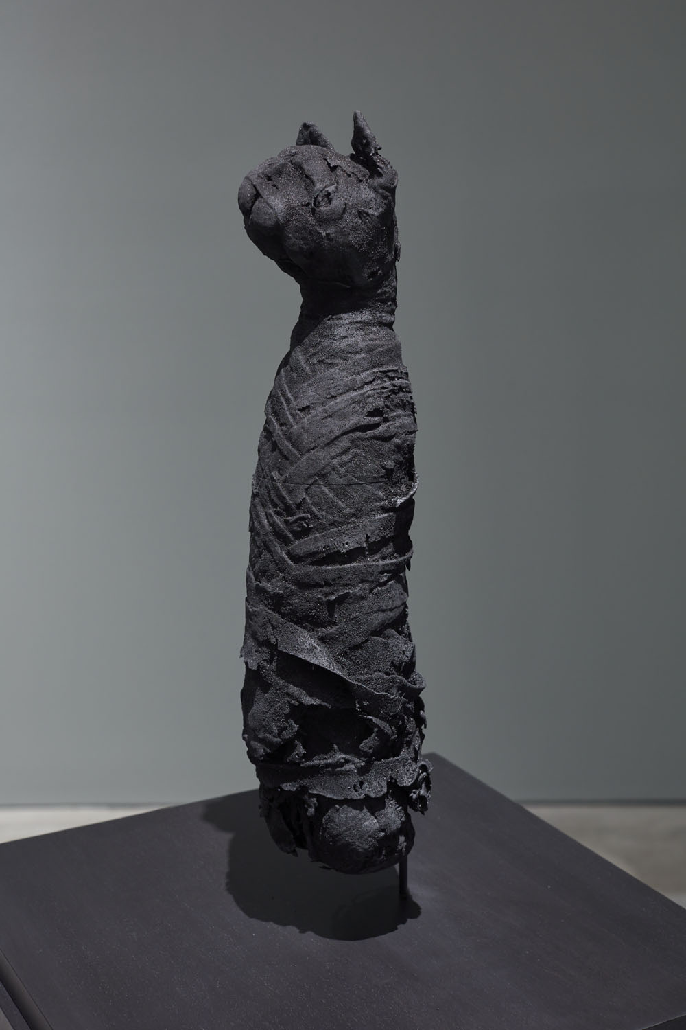 Cat Mummy. Ash-infused polymer, 16 × 3.5 × 3.5 in.