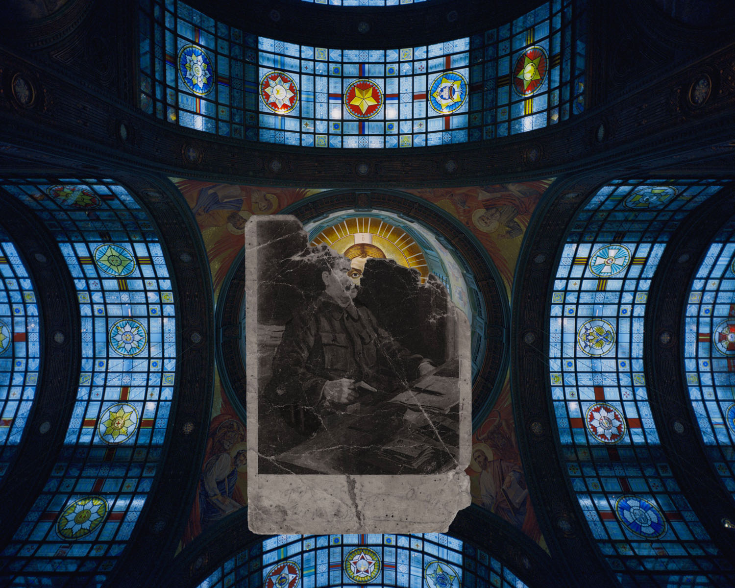 Blue mosaic church ceiling with Naum Lipkin portrait collage over Jesus
