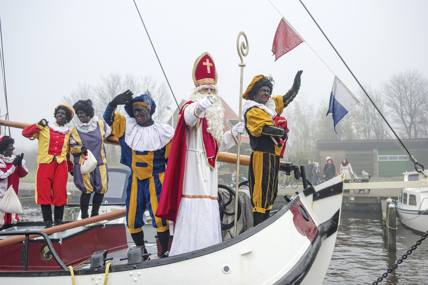 The arrival of Sinterklaas (Saint Nicholas) and Zwarte Piet (Black Pete) in a Frisian village in the Netherlands on November 24, 2012. (Patrick Post / Hollandse Hoogte)