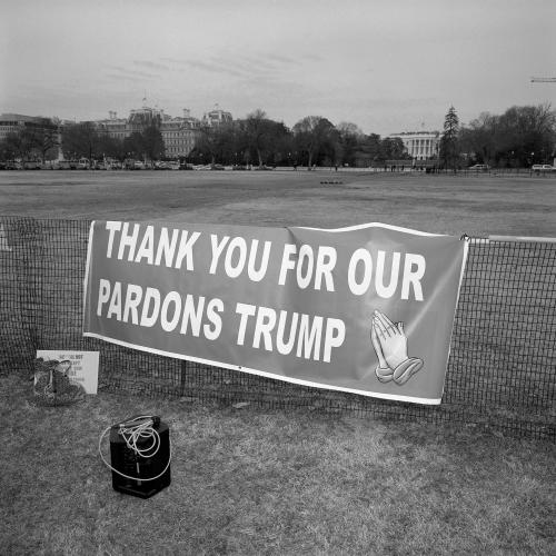 Sign on fence.