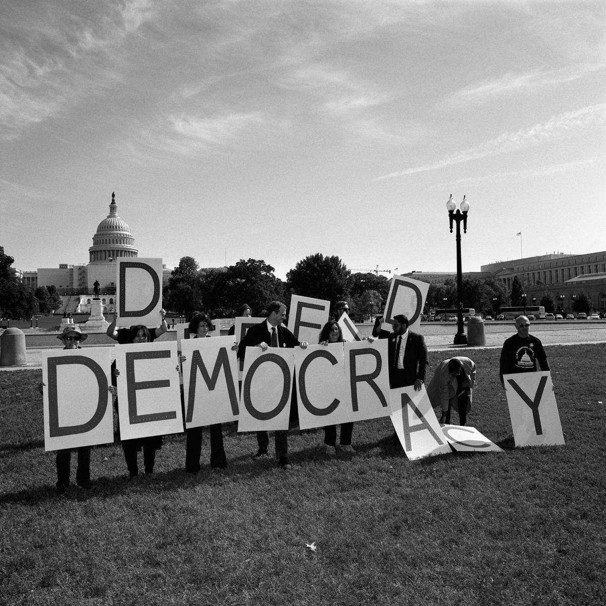 People holding signs.