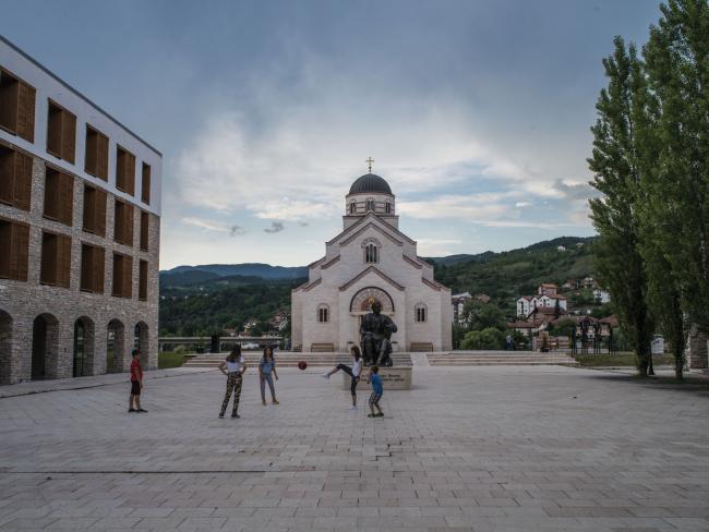 Children play in Andrićgrad, a kind of Serb-nationalist theme park. Višegrad, June 2020. 