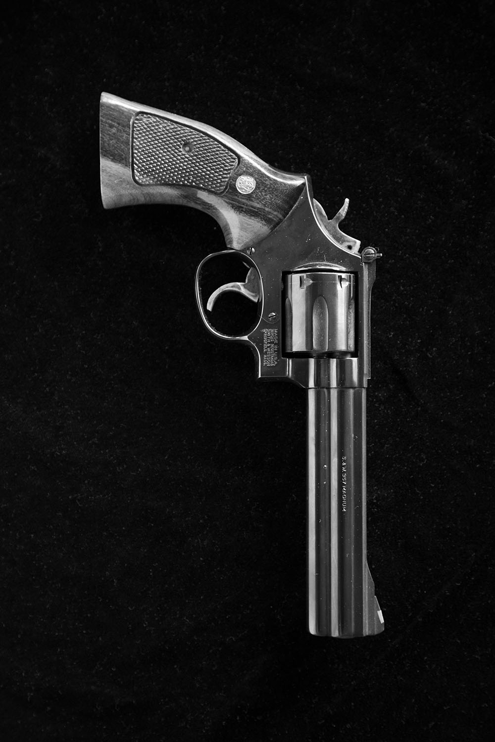 Revolver on black backdrop