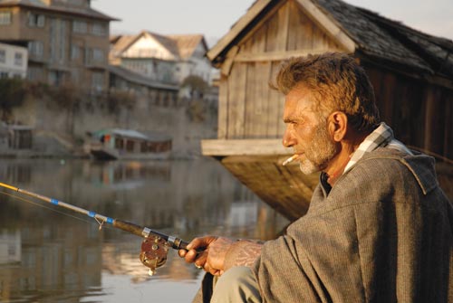 Man Holding a Fishing Rod