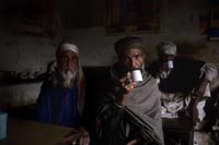 Lahore: Indigents at a tea stall.