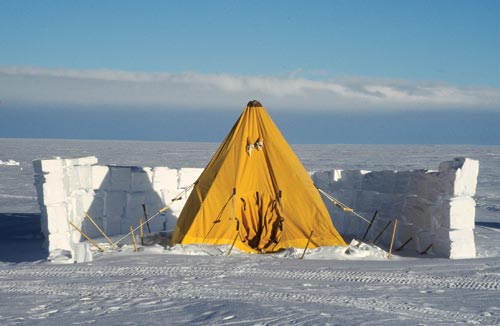 Tent Surrounded by Blocks of Snow