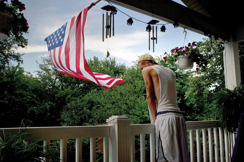 Cody Wymore, teenage son of Sergeant Tim Wymore, on the deck of the family home in St. Charles, Missouri.