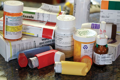 LeRoy Torres's kitchen counter is piled with medications, but doctors have not found an effective treatment.