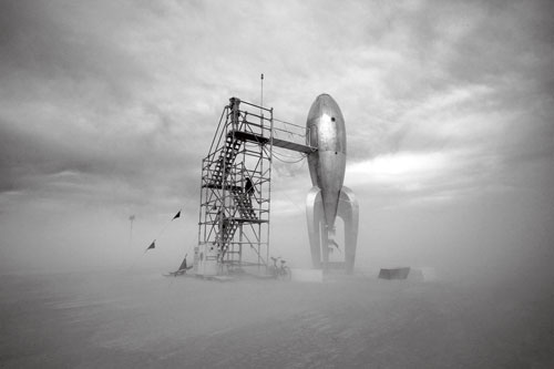 A surreal rocket and scaffold at the Burning Man festival in Nevada