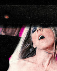 A gritty, close-up image of a woman with her head thrown back, eyes closed, mouth open.  Her only visible shoulder is bare.  The situation is ambiguous.  She could just as easily be singing on stage or engaged in a sexual act.