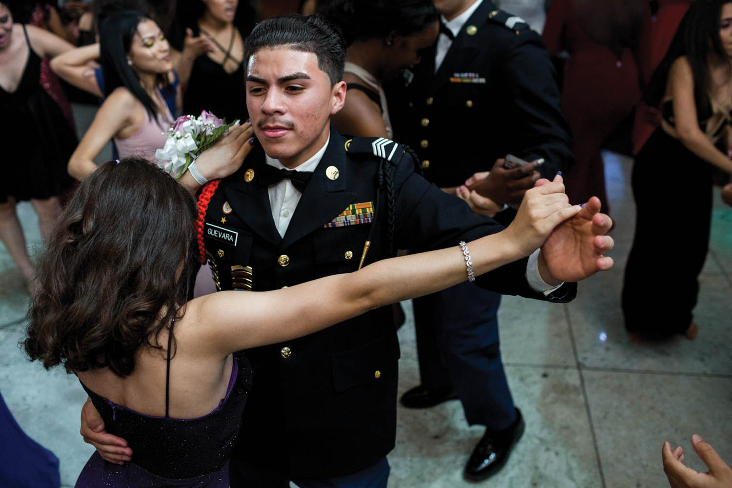 Students from Theodore Roosevelt Educational Campus celebrate the grand finale of its seventh annual JROTC Military Ball at the Villa Baron Mansion (Bronx, NY). Photographed by Sarah Blesener