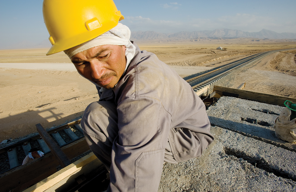 Uzbek workers build a signal station on the new railway spur between the northern Afghan city of Mazar-e-Sharif and Uzbekistan.