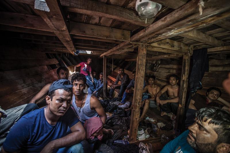 Bangladeshi and Pakistani migrants in the lower deck of a Libyan fishing boat (designed for a crew of ten) with 416 men, women, and children aboard. The boat had been at sea more than twelve hours before being intercepted by the MOAS ship the Phoenix.