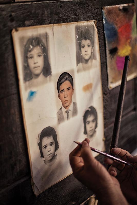 Photo painting is one of the signature traditions of northeast Brazil. Originally it involved tracing black-and-white photos onto a specialized paper, then applying color by hand. Today the work is done digitally.