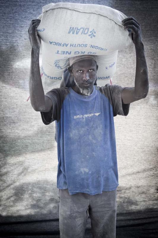 Hussein Moalim Mahdi, 50 — I’m a porter at a maize mill with a wife and six children. I can’t afford to send them to school on my salary, and unfortunately I can’t talk long because I only get paid for each bag I carry— ten cents per bag.