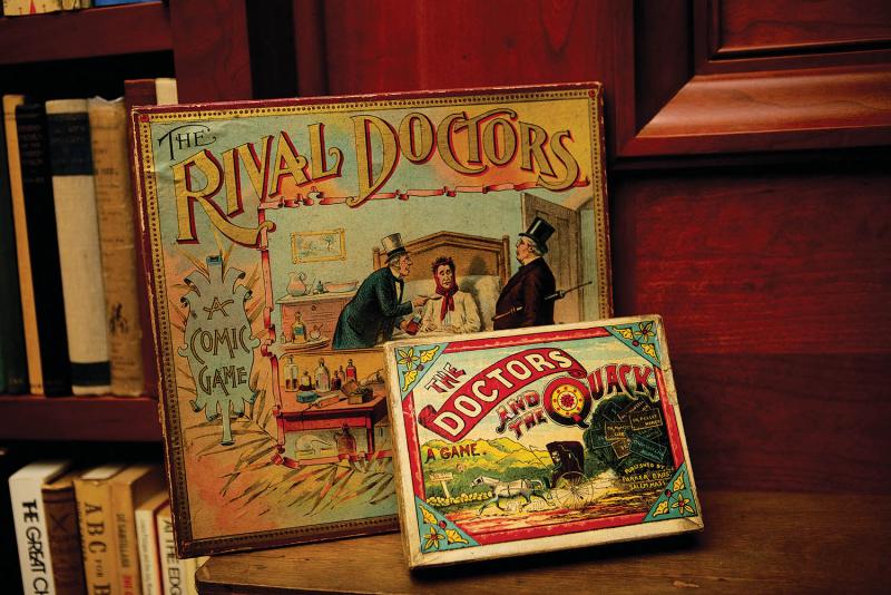 Nineteenth-century quackery board games from Helfand’s private collection. (Kirsten Luce)