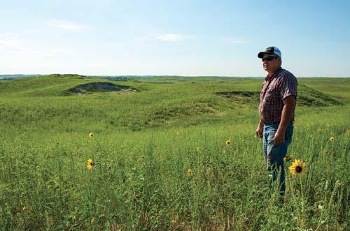 Bruce Boettcher on his Sandhills ranch in July, south of Atkinson, Nebraska.