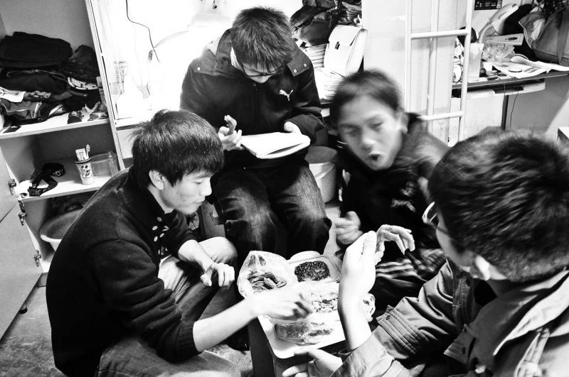 A late-night snack  in the dorm following night lessons. From Yuyan Liu's "Home of Youth."