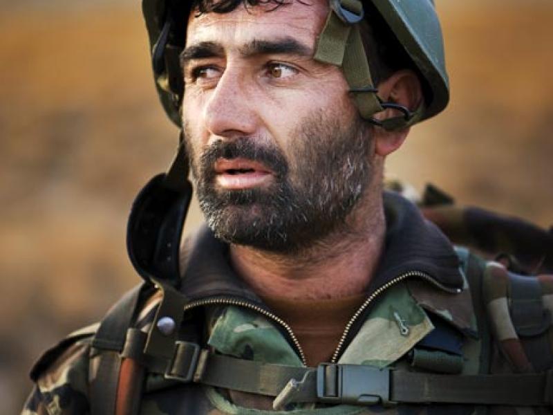 Forty year-old Captain Gholam Mojatba, a Tajik from the northern province of Panshir, on patrol in the Depak Valley. Captain Mojatba joined the mujahideen to fight the Soviet occupation as a teenager. He has been fighting ever since.